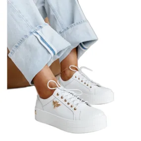 Chaussures en cuir blanc avec boucle décorative blanche