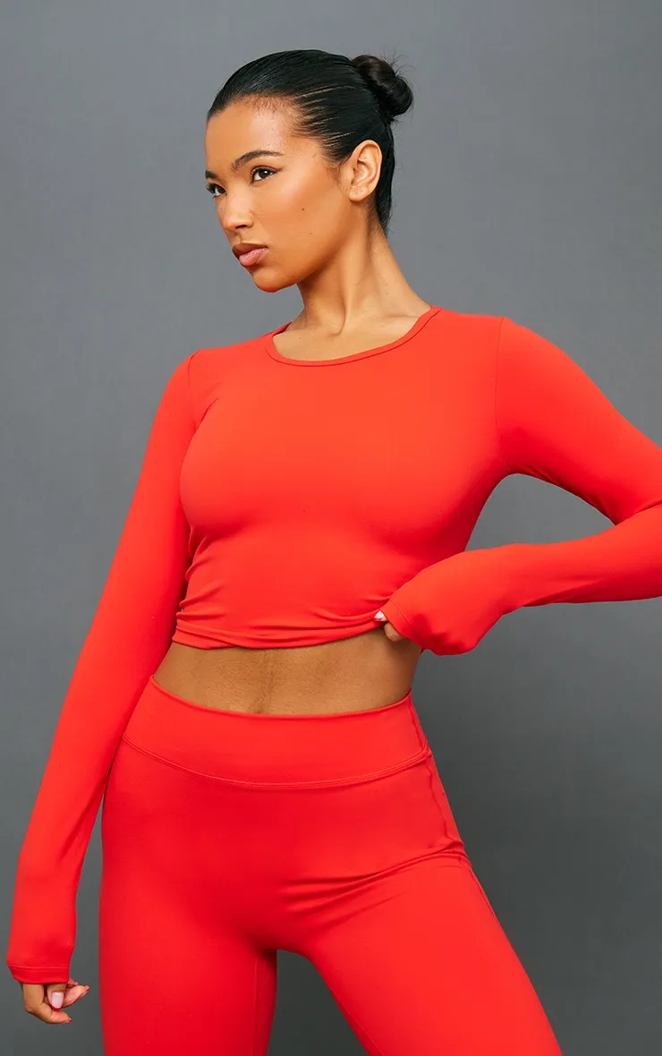 Crop top manches longues en sculpt rouge tomate à détail contours