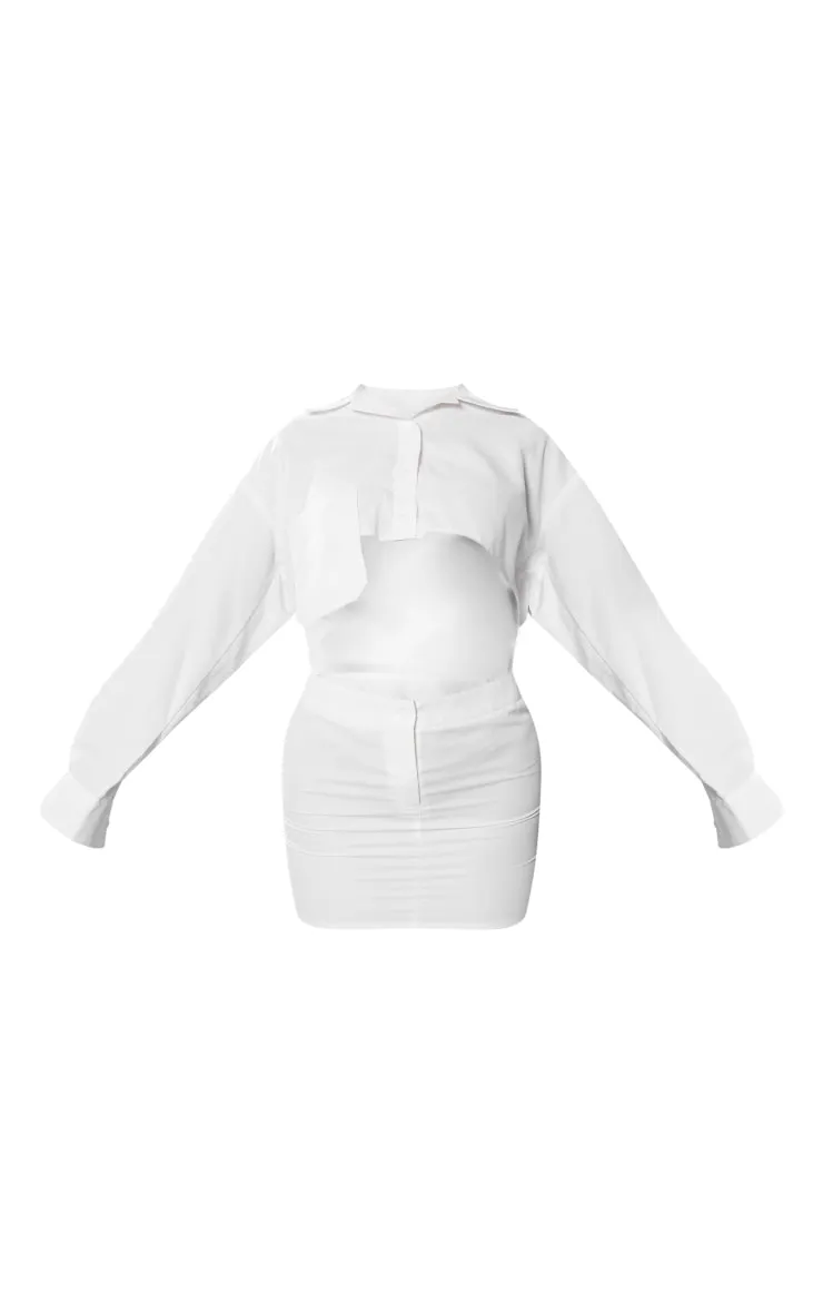 Robe chemise blanche découpée à poches et manches longues